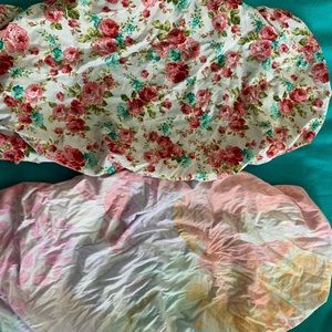 Two girls bassinet sheets.